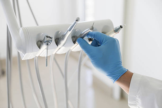Professional Emergency Dentist technician working in Dickinson, ND